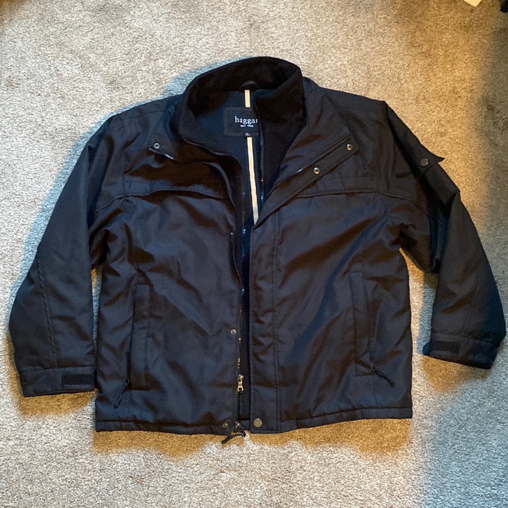 Men’s Haggar brand mid weight black jacket. Zipper & button closure size large
